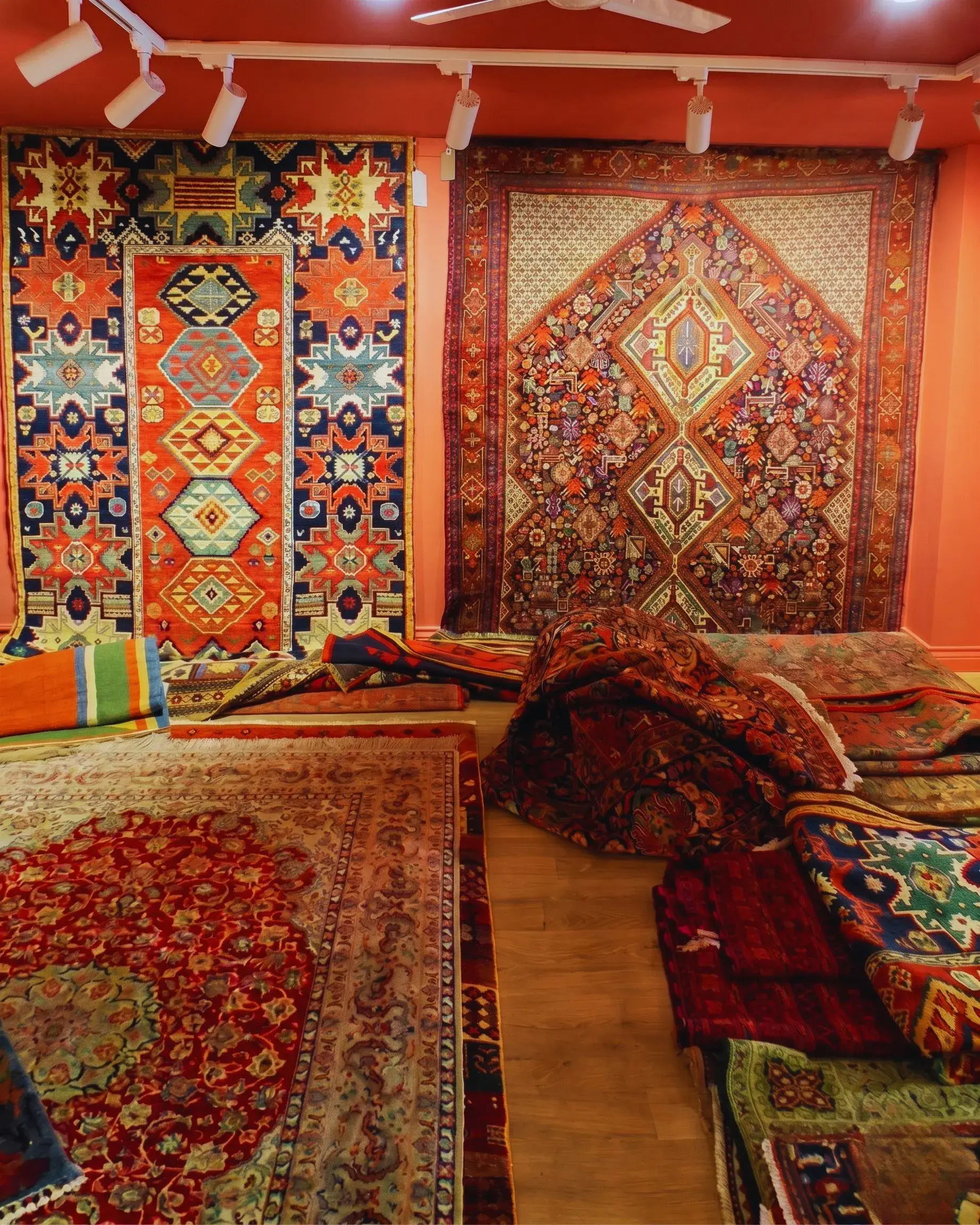 Hand-knotted oriental rugs displayed in the Saverys showroom in Broadway